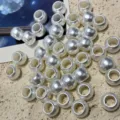 Detailed view of 10mm white acrylic imitation pearl large hole beads for DIY jewelry and crafts. - Pearl White