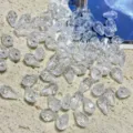 Acrylic teardrop crystal bead detail showing clear faceted surface for jewelry crafting. - 8X12mm / Clear