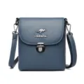 Blauwe lederen crossbody tas, stijlvolle kleine schoudertas variant met metalen sluiting. - Blauw