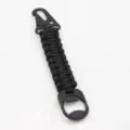 Tactical paracord keychain with carabiner and bottle opener, black outdoor gear accessory. - Black