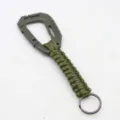 Green paracord keychain with plastic carabiner and metal ring for outdoor backpack use. - Army Green
