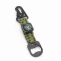 Close-up detail of tactical paracord keychain with durable metal carabiner and compass. - Army Green