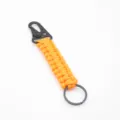 Porte-clés paracorde orange, lanière tressée avec mousqueton et anneau métallique noir. - Orange