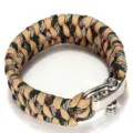 Detailed close-up of handmade survival paracord bracelet with durable zinc alloy shackle clasp. - Camouflage
