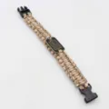 Detailed view of handmade paracord survival bracelet with tactical buckle and American flag metal tag. - No. 233