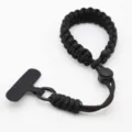Duurzame zwarte paracord polsband voor telefoon met verstelbare gesp voor veilig gebruik. - Zwart