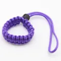 Purple paracord wrist strap, durable braided lanyard for camera and outdoor survival gear. - Purple