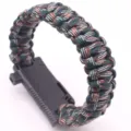 Survival paracord bracelet with multi-functional buckle for outdoor camping and emergency use. - Forest Camo