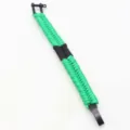 Green and black paracord survival bracelet with metal shackle, durable outdoor wrist rope. - Emerald Green and Black