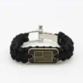Black paracord survival bracelet with metal flag tag and adjustable shackle clasp for men. - Silver Black