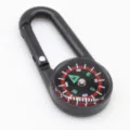 Multi-functional black carabiner with built-in camping compass, durable outdoor survival tool. - Black
