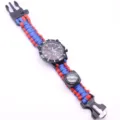 Outdoor multifunctional survival paracord watch detail showing blue red woven strap and compass. - Red & Royal Blue