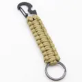 Khaki paracord keychain with black metal carabiner bottle opener and sturdy split ring. - Khaki