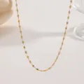 Detail shot of minimalist gold-plated stainless steel chain necklace, exquisite light luxury design. - Lip Chain (XKN0248) / Gold