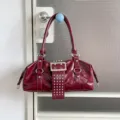 Dark red patent leather studded motorcycle handbag, stylish vintage commuter shoulder bag. - Red