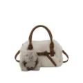 Furry plush crossbody pillow bag for women, white faux fur with brown leather handles and charm. - With Pendant / Off White