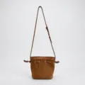 Braune Beuteltasche aus echtem Leder für Damen, stilvolle Umhängetasche für den Alltag. - Karamellbraun