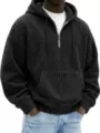 Detailed view of men's corduroy half-zip hoodie featuring kangaroo pocket and ribbed hem. - S / Tops / Black