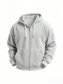 Close-up detail of grey corduroy zip-up hoodie featuring vertical stripes, drawstrings, and pockets. - S / Tops / White
