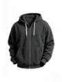 Detailed view of dark grey corduroy zip hoodie texture, hooded sweatshirt fabric close-up. - Black