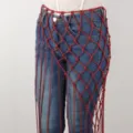 Red macrame waist belt fringe rope mesh accessory paired with classic blue denim jeans. - SP-262R Red Woven Style (Style) / One Size / Red