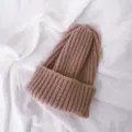 Children solid color knitted beanie hat, soft warm winter wool cap, cozy ribbed detail. - One Size / Pink