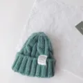 Kinder Zopfmuster Strickmütze Detailansicht, warme Winter Pulli Mütze mit Stoffetikett. - 50-60cm / Minzgrün