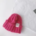 Pink cable-knit children winter beanie hat with woven label stylish warm pullover cap - 50-60cm / Rose Red