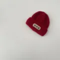 Kids red knitted beanie hat winter warm woolen cap with a cute embroidered label. - 48-52cm / Burgundy