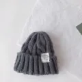 Grey cable knit kids beanie hat, warm winter pullover hat with cloth label for boys and girls. - 50-60cm / Gray