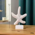 Dekoratives Seestern-Ornament aus Holz mit Ständer, maritime Heimdekoration Figur. - Seestern Holzschnitzerei Ornament