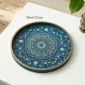 Round decorative wooden storage tray with blue mandala floral pattern and gold rim. - Blue Pattern Tray