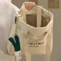 Canvas tote bag for women large capacity shoulder bag casual commuter handbag with cute pendant. - Bag With Pendant / Off White