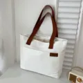 Canvas tote bag for women, large capacity shoulder bag, casual commuting student handbag. - L / White