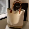 Spacious canvas tote bag with brown handles and bottom, casual daily shoulder bag for commuting. - Brown Stitched (Regular)
