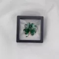 Exquisite green four-leaf clover brooch pendant inside a clear floating frame display box. - Transparent Suspension Box