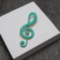 Elegant turquoise enamel treble clef music note brooch pin for music lovers and students. - Teal