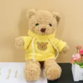 Cute teddy bear plush toy wearing yellow hoodie, soft stuffed animal doll for kids birthday gifts. - Yellow Hoodie Style