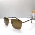 Vue détaillée de lunettes de soleil homme monture métal verres bruns anti-UV. - Monture Dorée Verre Thé