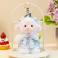 Cute white plush lamb toy detail, featuring fluffy fleece, blue floral dress and delicate lace. - Floral White Little Lamb
