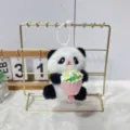 Cute plush panda doll pendant detail showing fluffy texture and small flower bouquet design. - 13cm / Panda - Holding Flowers