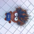 Plush doll keychain with spiky explosive hair, funny bag charm and fluffy toy variant. - Black Beige