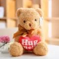 Cute plush teddy bear doll with gold bow and heart pillow, soft hugging toy for gift. - Beige Hug Heart Bear