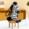 Cute angry zebra plush keychain, creative cartoon stuffed animal backpack pendant for gifts. - Zebra
