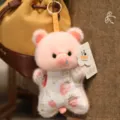 Cute pink plush pig keychain pendant with sweet strawberry dress accessory variant style - Pig
