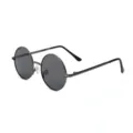 Round metal frame children sunglasses detail view with dark polarized lenses and thin temples. - Gray