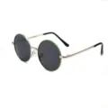 Closeup of round metal kids sunglasses detail showing green frame rim and black temple tip. - Silver Green