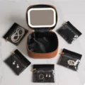 Portable leather makeup case with LED light mirror and five clear pouches for travel. - 5 Sub-bags/LED Mirror Set / Brown