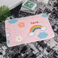 Pink pet mat variant featuring cute rainbow cloud pattern, cozy sleeping bed for pets. - Rainbow