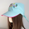 Light blue headscarf baseball cap with embroidered flower pattern and pink brim for women. - Flower Blue